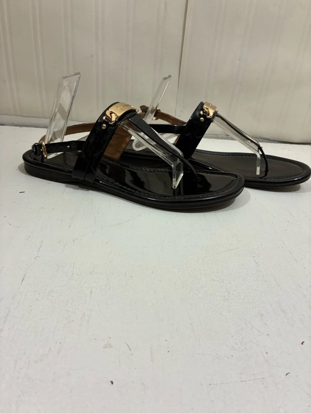 Coach Black Patent Leather T-Strap Sandals with Gold Plaque